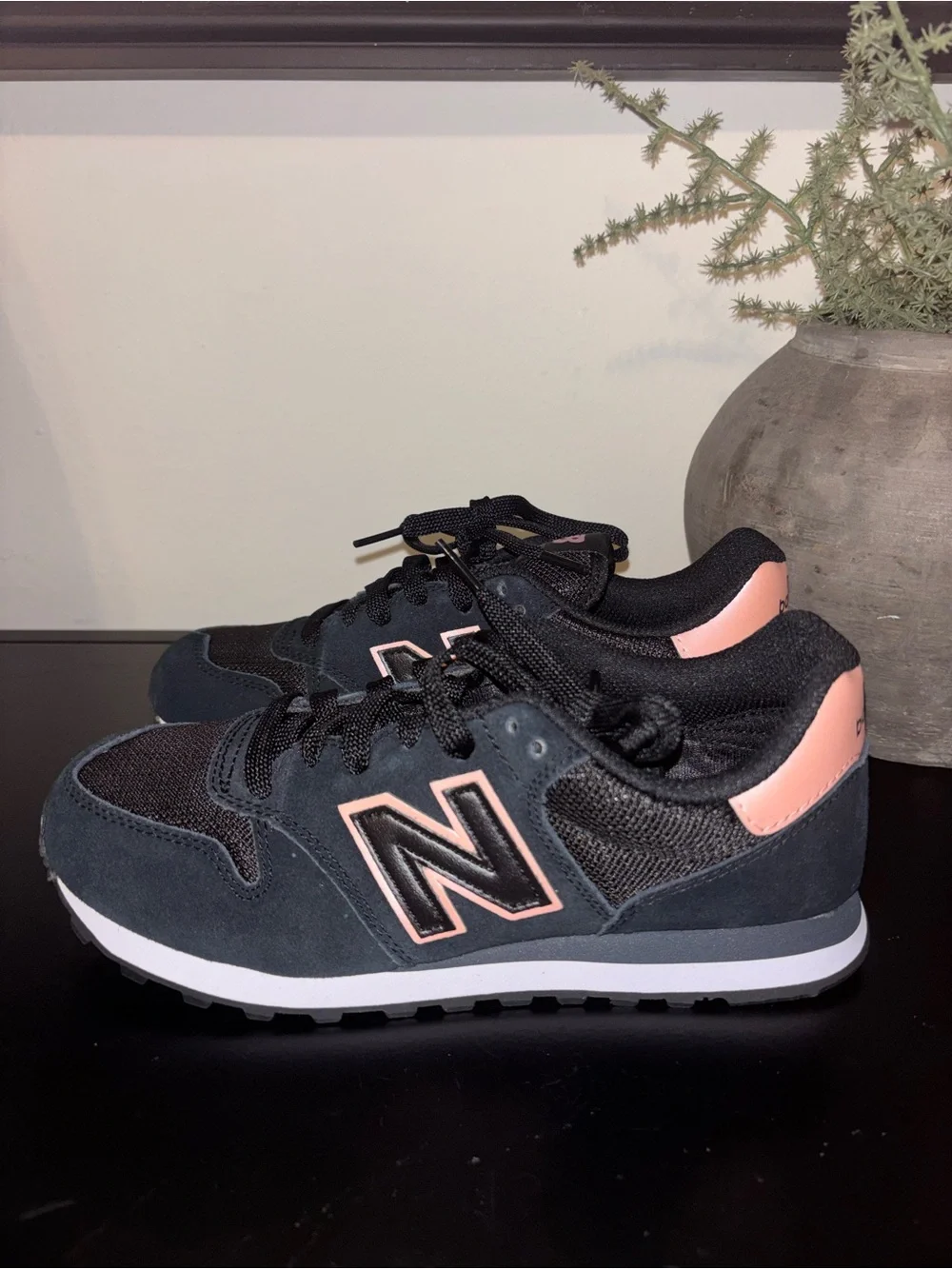 New Balance Black Sneakers with Pink Accents